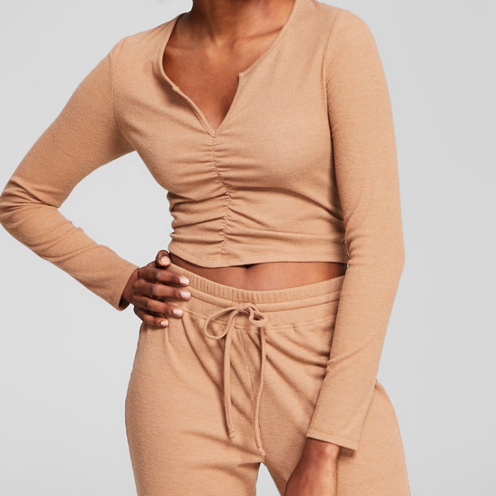 Henley-inspired top from And Now This features a ruched front and a cropped fit